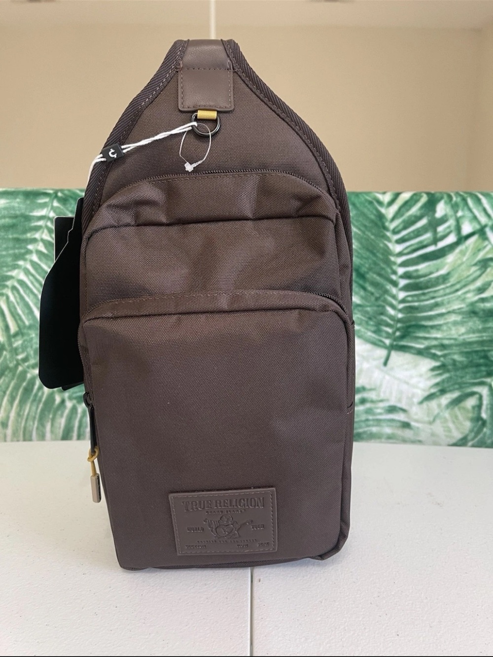 True Religion Brown Sling Belt Bag with Gold Accent